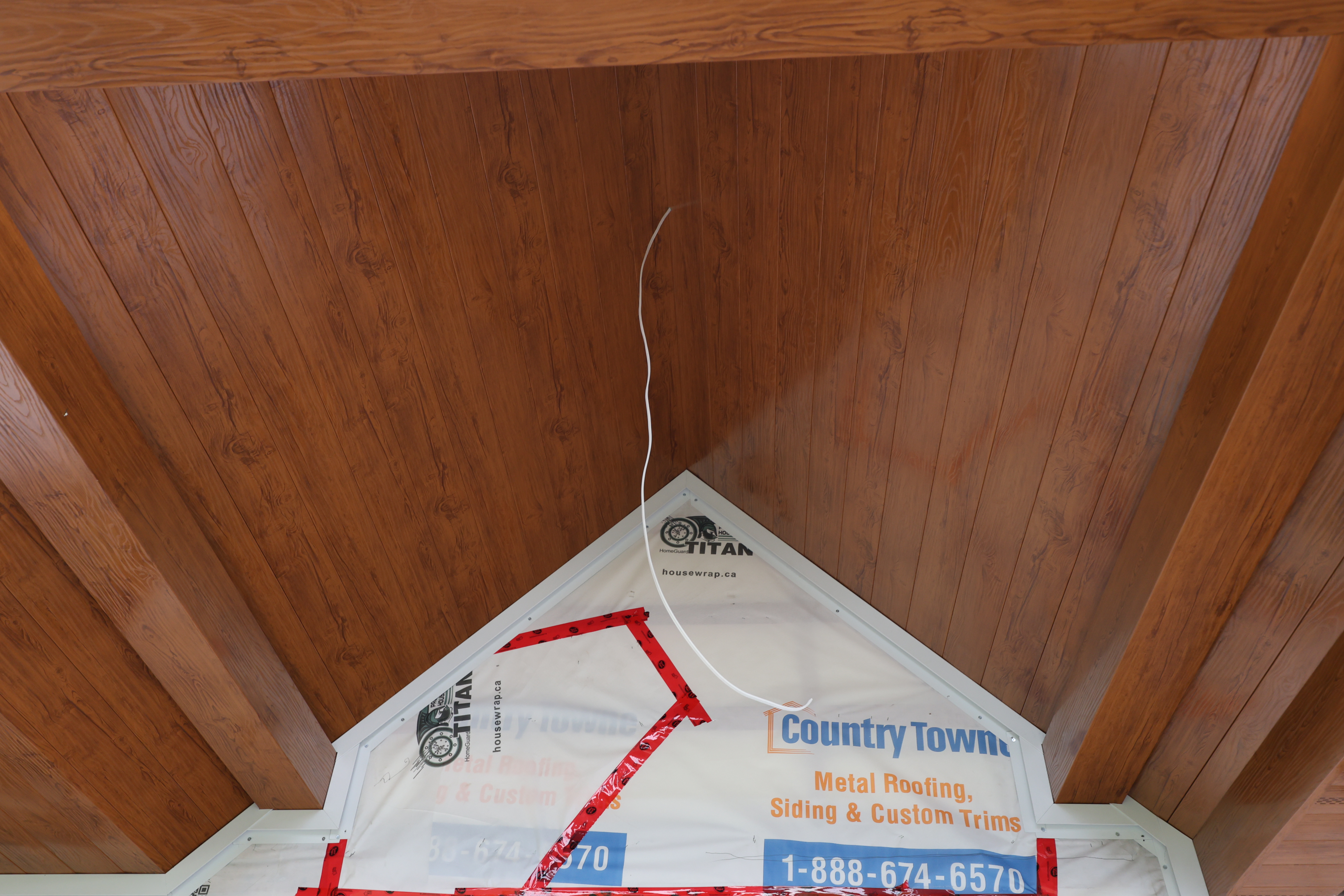 Country Towne Naive Brown metal soffit, showcasing realistic woodgrain texture and premium craftsmanship, designed to add warmth and durability to exterior spaces