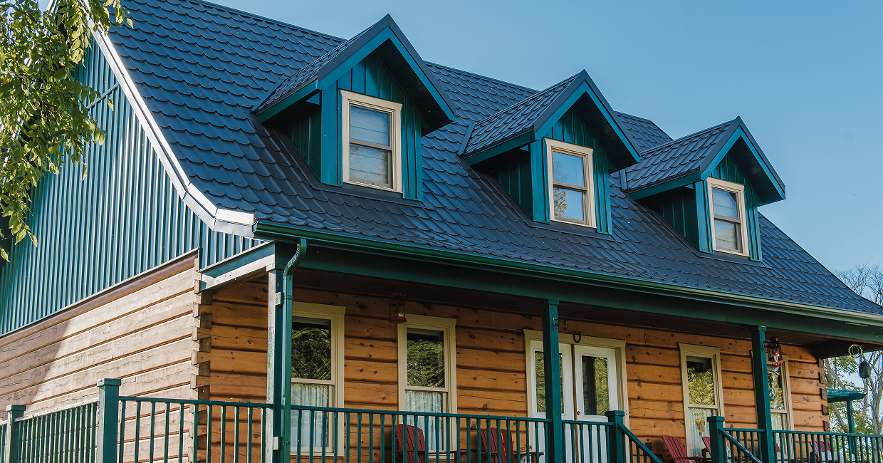 Beautiful home in Chatham-Kent Ontario with metal shingle roof and vertical siding by Country Towne