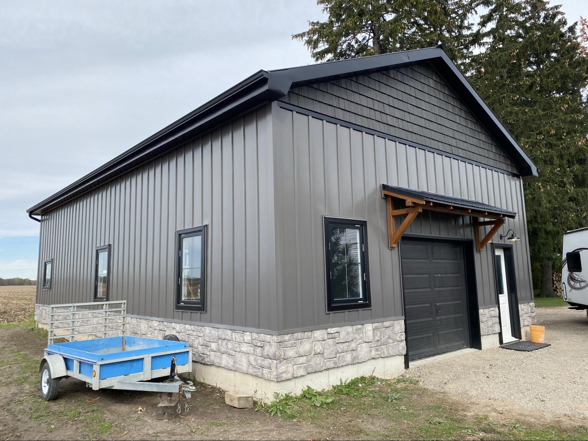 A garage with steel siding installed.
